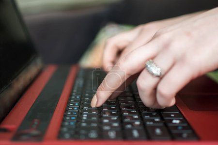 Photo for Close-up of typing female hands. - Royalty Free Image