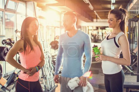 Photo for Friends talking while having a break at gym. - Royalty Free Image