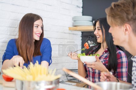 Photo for Group of young people preparing food at kitchen - Royalty Free Image