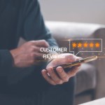 customer service survey feedback concept, businessman using smartphone give review and five stars rating to business services