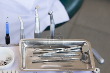 Photo for Steel Dentist tools on table, stomatology and tooth care - Royalty Free Image
