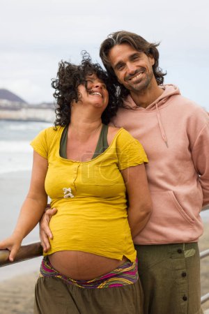 Photo for Expecting baby woman and man, happy couple outdoors - Royalty Free Image