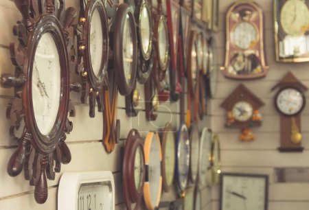 Photo for Clocks hanging on wall at shop. Time concept - Royalty Free Image