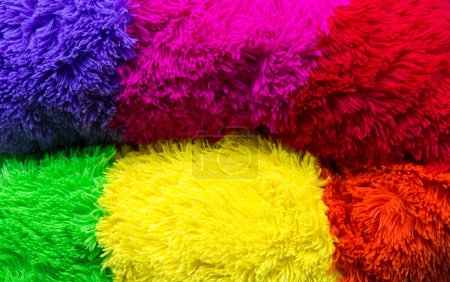 Foto de Brillante colorido peludo juguete fondo abstracto. Concepto de orgullo gay multicolor - Imagen libre de derechos
