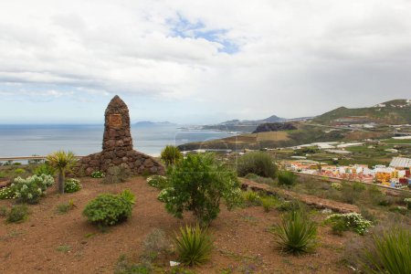 Photo for La Atalayita mountain view point in north Gran Canaria islands, Spain. Cloudy day by Santa Maria de Guia city. Stone monument - Royalty Free Image