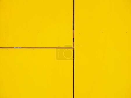 Yellow painted wall texture background