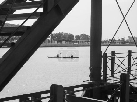 Photo for Huelva, Spain.  May 2022.  Canoeists on the Tinto dock in Huelva, Spain. - Royalty Free Image