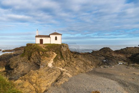 Photo for In the photo you can see a hermitage on top of some cliffs in the town of Valdovino, Galicia, with a blue sky with clouds. - Royalty Free Image