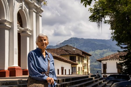 Senior woman tourist at the beautiful heritage town of Salamina in the department of Caldas in Colombia