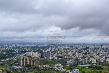 Photo for A clear top view of Nashik City, India from top of the mountains during rainy season. - Royalty Free Image