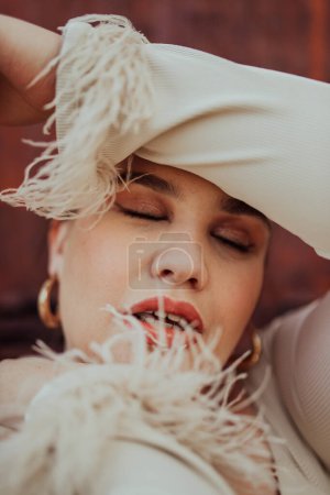 Photo for A close-up, unretouched portrait of a naturally beautiful young woman showcasing her authentic and unaltered facial features, capturing the essence of real beauty without any digital enhancements - Royalty Free Image