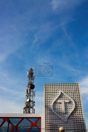Photo for Tall telephone poles are ready to transmit internet and telephone signals so that people can make maximum use of them against the backdrop of the beauty - Royalty Free Image