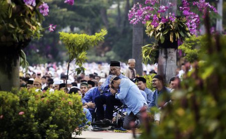 Photo for Indonesian Muslims carry out the Eid al-Fitr prayer in Surabaya, East Java - Royalty Free Image