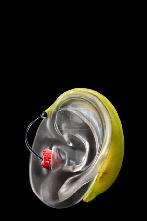 Photo for Imitation hearing aid -Conceptual photo-Close-up on a black background. - Royalty Free Image