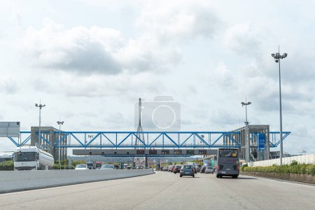 Photo for Bridge of Normandy, Le Havre, France - 6-june- 2023 Cars passing through the toll station - Royalty Free Image