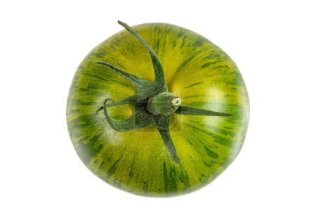 Téléchargez les photos : Tomate zébrée verte fraîche entière à proximité et tomates en arrière-plan - en image libre de droit