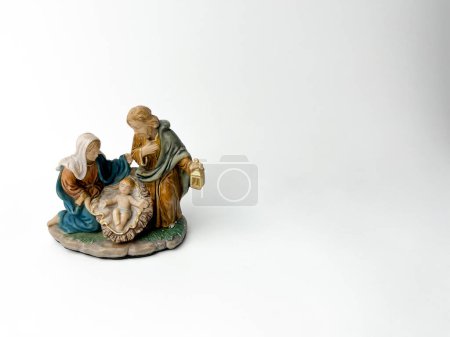 Photo for Maria, Joseph, and Baby Jesus decorative interior object photography isolated on plain white horizontal studio background with empty copy space for texts. - Royalty Free Image