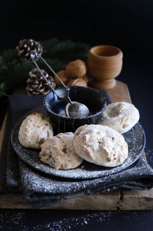 Photo for Cavallucci, traditional Tuscan Christmas pastry with anise, orange peel and walnuts on dark background. Christmas decorations.Traditional Italian dish. - Royalty Free Image