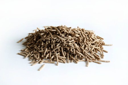Bran sticks isolated on white background. Breakfast cereals rich in fibre. Healthy food. Copy space. Overhead view.