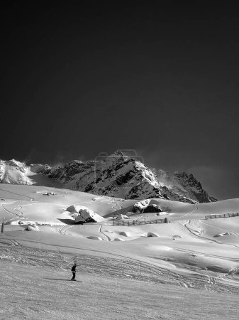 Photo for Snow-covered slopes ski resort black and white image - Royalty Free Image