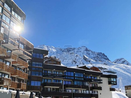 Photo for Hotel on background of snow mountains in ski resort - Royalty Free Image