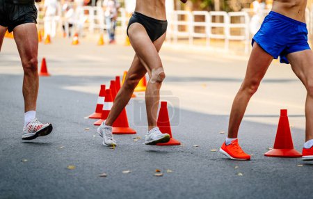 Photo for Group athletes male and female racewalking - Royalty Free Image