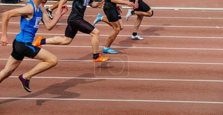 Photo for Chelyabinsk, Russia - June 4, 2022: group male athlete running sprint race in spikes shoes Nike during UFD Athletics Championship - Royalty Free Image