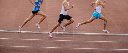Téléchargez les photos : Chelyabinsk, Russia - June 4, 2022: group runners in spikes shoes Nike running middle distance at stadium during UFD Athletics Championship - en image libre de droit