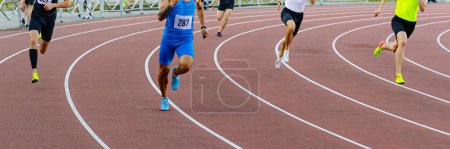 Photo for Group male runners running track of stadium sprint race, athletics competition, summer sports games - Royalty Free Image
