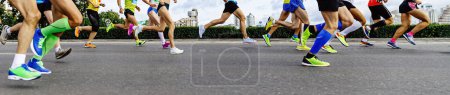 Photo for Legs group runners, men and women, running marathon. athletes jogging city race, summer world championships - Royalty Free Image