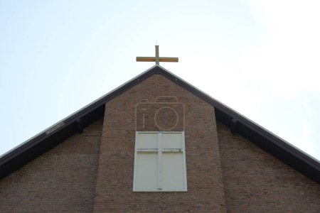 Photo for Reflective photograph of an old church made of bricks - Royalty Free Image