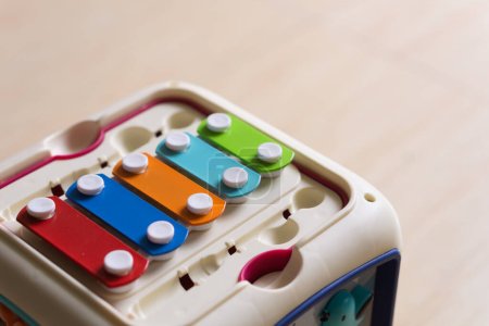 Photo for Close up colorful xylophone with blurry wooden floor background - Royalty Free Image