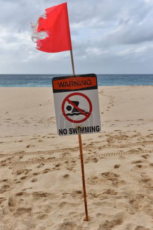 Photo for No swimming sign on the beach - Royalty Free Image