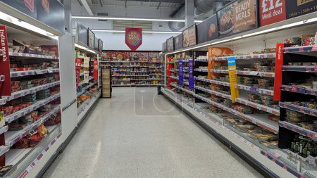 Photo for A ready cooked food aisle is seen in a Sainsburys supermarket on October 19, 2023 in London, UK. Sainsburys is Britain's 2nd largest supermarket retailer after Tesco with 1400 stores. - Royalty Free Image