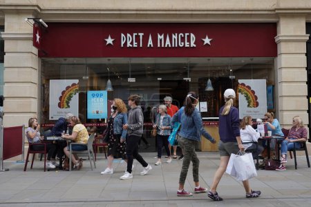 Photo for People dine in a Pret A Manger sandwich shop on July 24, 2020 in Bath, UK. - Royalty Free Image