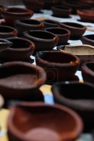 Photo for Artistic homemade clay oil lamps are ready for diwali and other festivals - Royalty Free Image