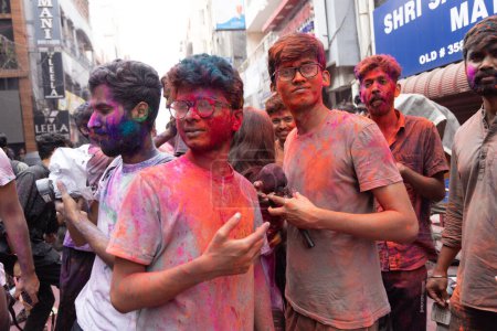 Photo for Chennai, Tamilnadu India - March 08 2023 : colorful street Holi celebration by large number of local people in Mint street, Holi festival portrait or Color splash Holi celebration - Royalty Free Image