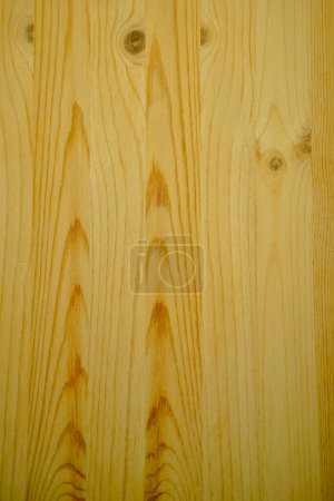 Polished yellow colored pinewood board