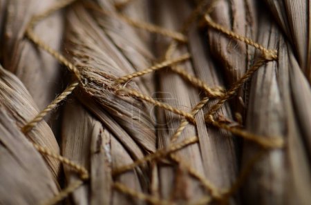 Photo for A straw basket macro shot, showing intricate details of the straw intertwining. - Royalty Free Image
