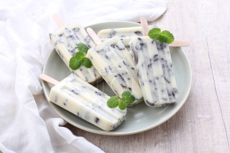 Photo for Fresh homemade ice cream with mint and thyme - Royalty Free Image
