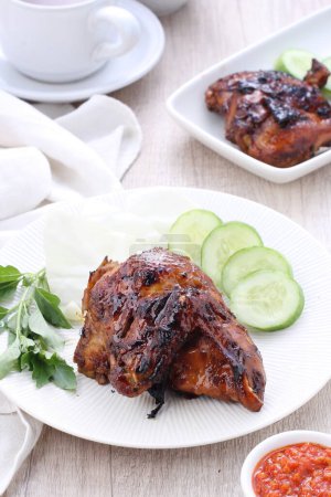Photo for Honey grilled chicken on a white plate - Royalty Free Image