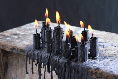 Photo for Black candle on black background - Royalty Free Image