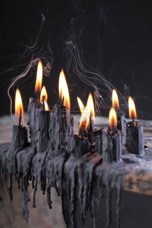 Photo for Black candle on black background - Royalty Free Image