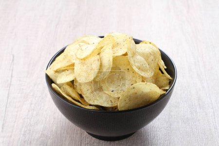Photo for Potato chip on a bright background - Royalty Free Image