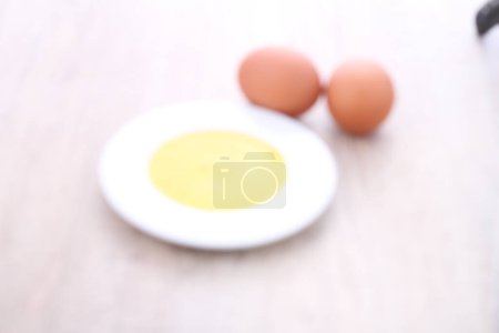 Photo for Egg yolk with a white background - Royalty Free Image