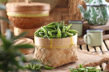 Photo for Fresh green beans in basket on wooden table - Royalty Free Image