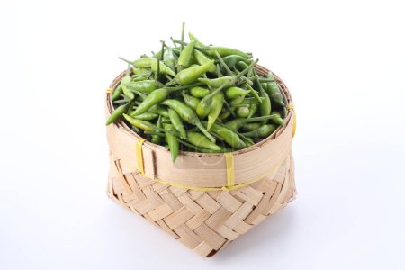 Photo for Green beans in wicker basket over white background, top view - Royalty Free Image