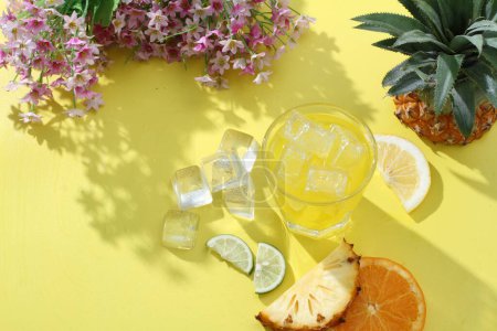 Photo for Refreshing summer lemonade, lime, lemon, ice and mint on a wooden background. - Royalty Free Image