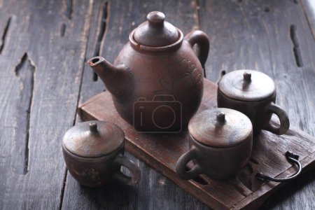 Photo for Ceramic tea pot and vintage teapot on old wooden background - Royalty Free Image