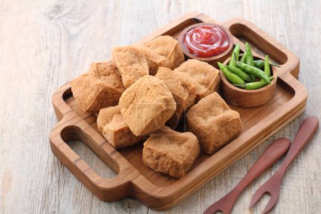 Photo for Tahu sumedang or Tahu bunkeng (Sumedangite tofu, bunkeng tofu) is a Sundanese deep-fried tofu from Sumedang, West Java, Indonesia. It was first made by a Chinese Indonesian named Ong Kino. It has some different characteristic from other tofu. - Royalty Free Image